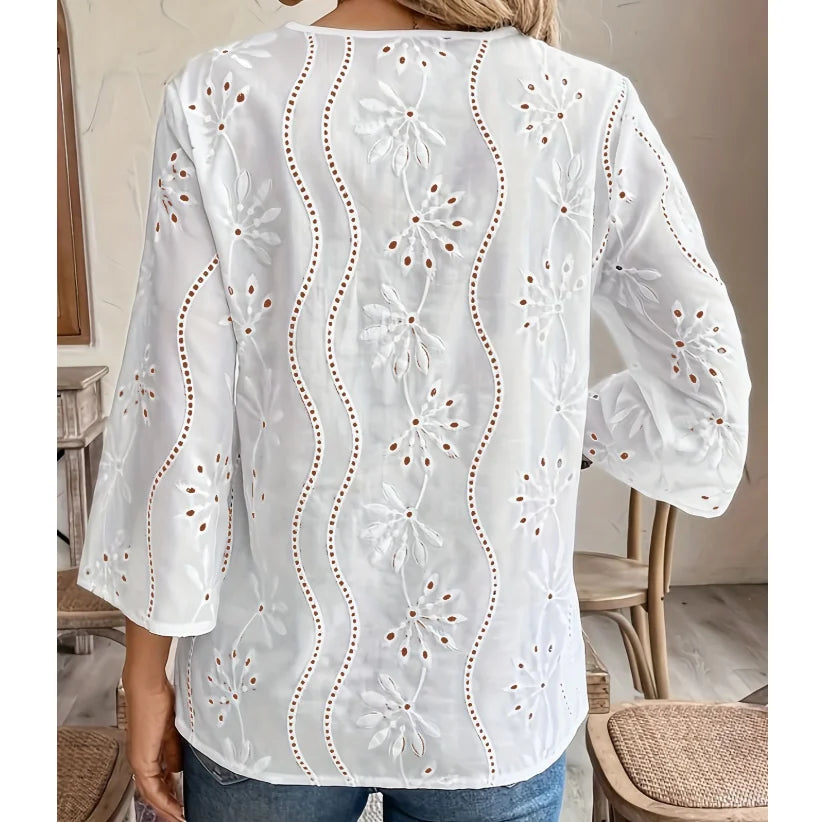 GISLA I VIELSEITIGE BLUSE MIT ÖSEN