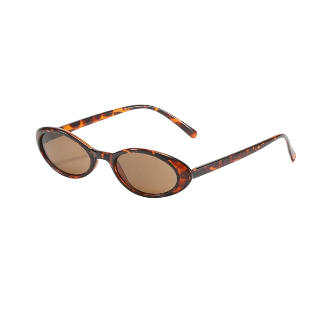 ODILIE I LÄSSIGE RUNDE SONNENBRILLE