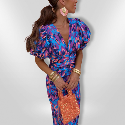 BOLIA I RETROKLEID MIT PUFFÄRMELN