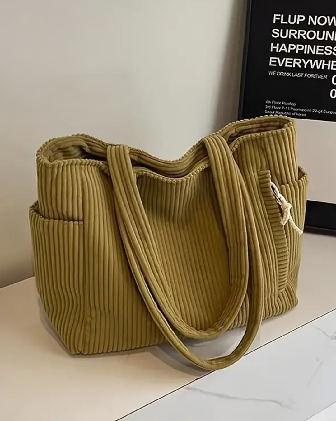 LEOBA I GERIPPTE CORD-HANDTASCHE