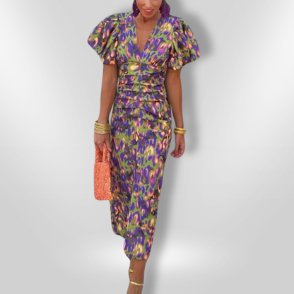 BOLIA I RETROKLEID MIT PUFFÄRMELN