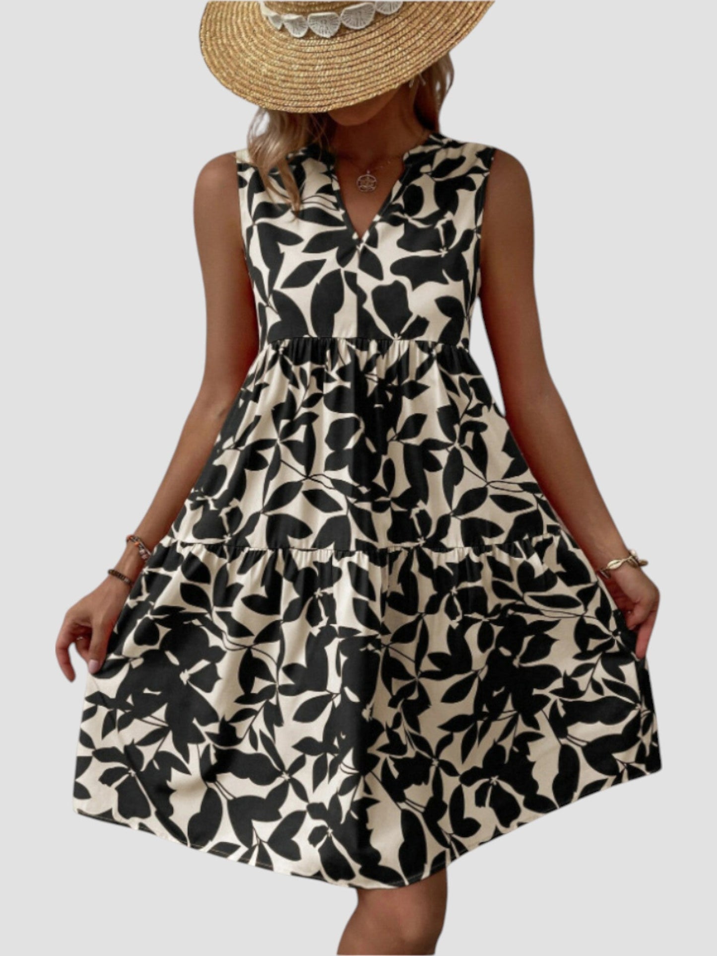 SERAPHINE I ÄRMELLOSES GEBLÜMTES KLEID