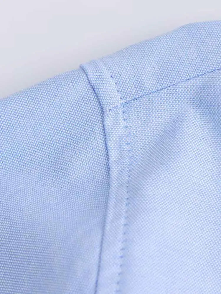 MALWINE I LÄSSIGE KRAGENBLUSE