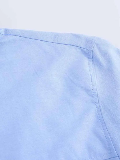 MALWINE I LÄSSIGE KRAGENBLUSE